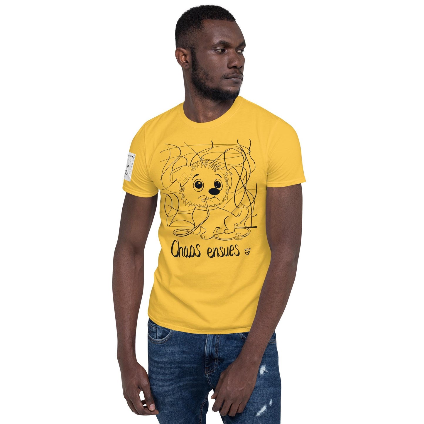 Man wearing yellow Chaos Ensues t-shirt with chaotic vet dog illustration and text – GrungePup Vet Chaos humor apparel