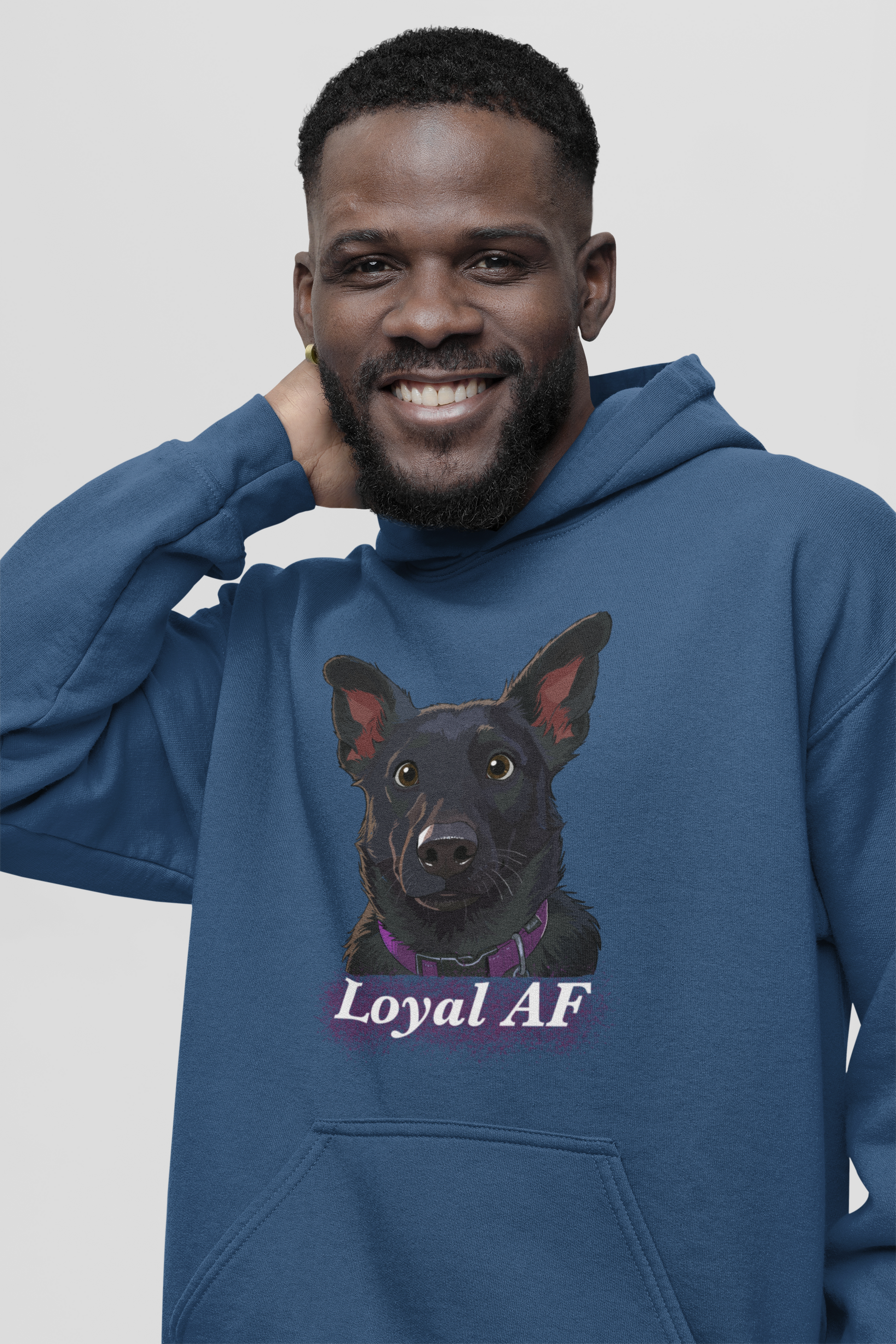 Close-up of smiling man wearing an indigo blue Gildan hoodie featuring the Mathis Loyal AF design