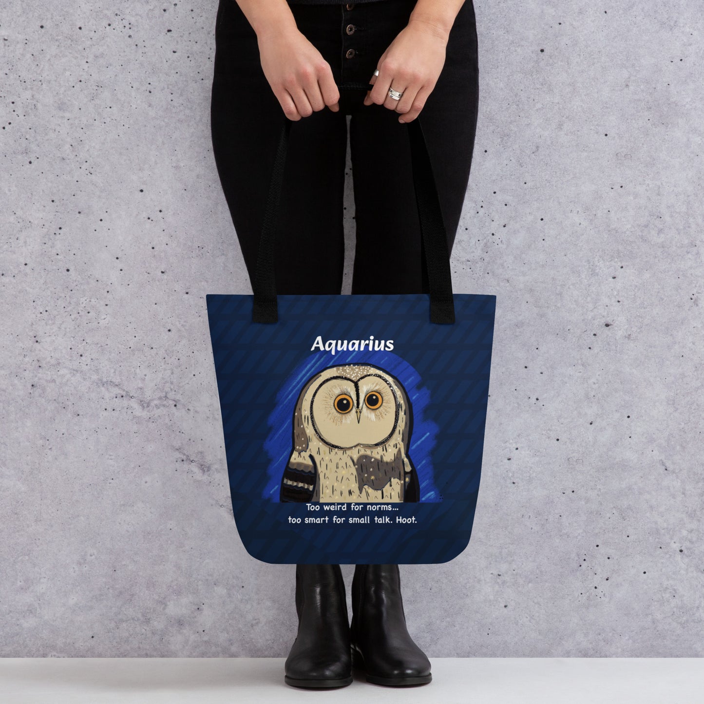 Front view of the Aquarius Owl tote bag being held by a person, showing the full all-over print design with the wise owl and cosmic background