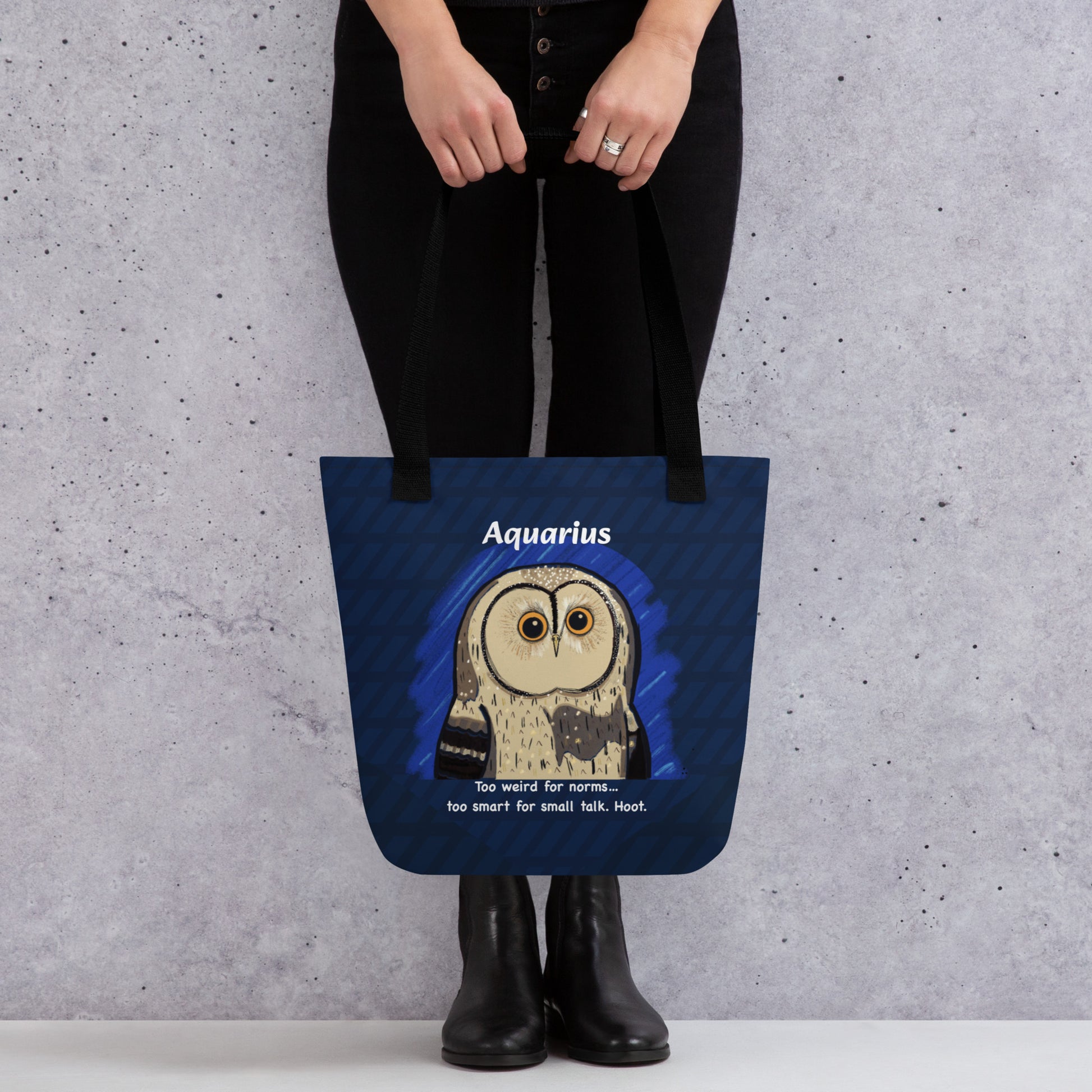Front view of the Aquarius Owl tote bag being held by a person, showing the full all-over print design with the wise owl and cosmic background