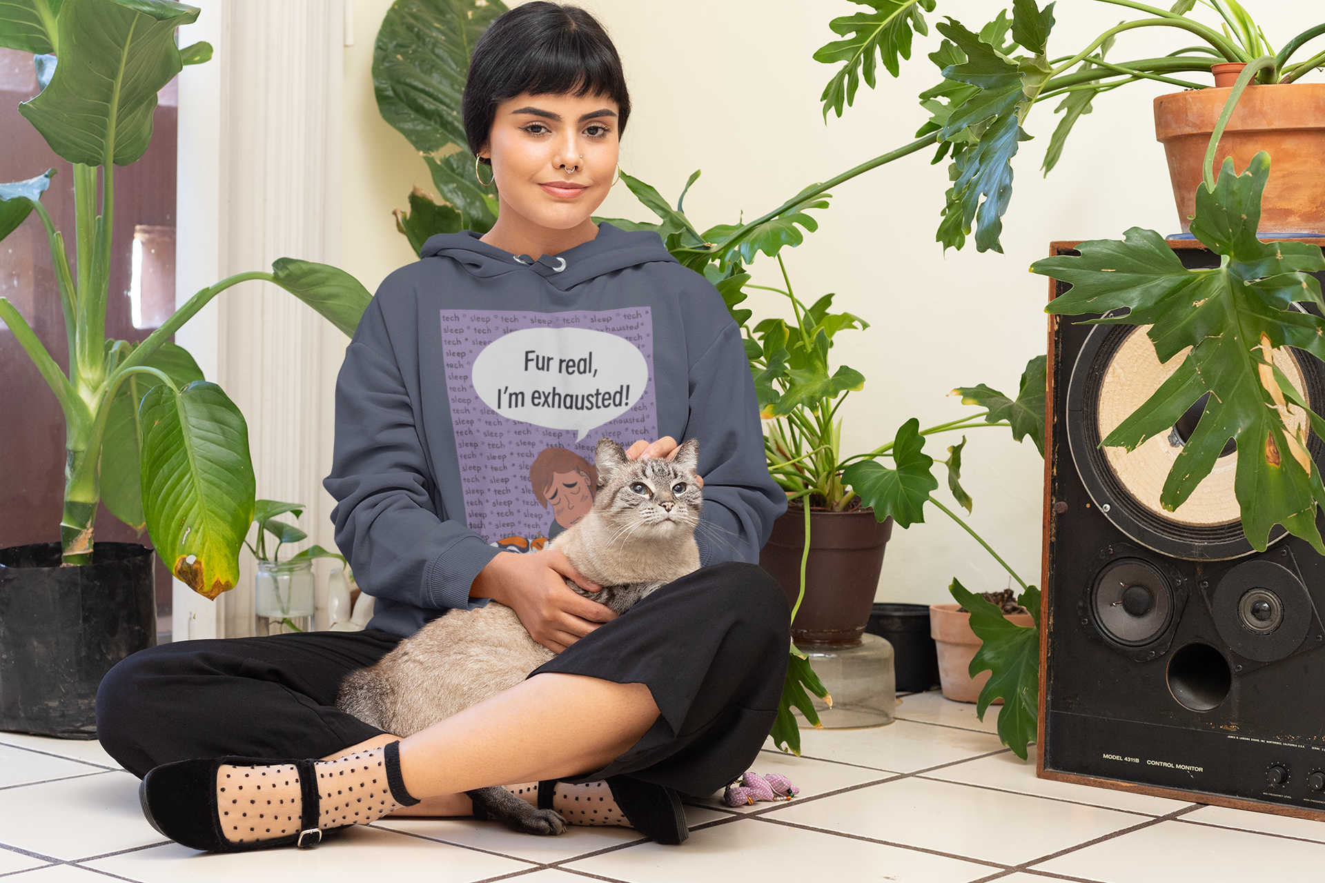 Woman sitting with cat wearing heather navy "Fur Real, I'm Exhausted" hoodie – cozy GrungePup Vet Chaos design