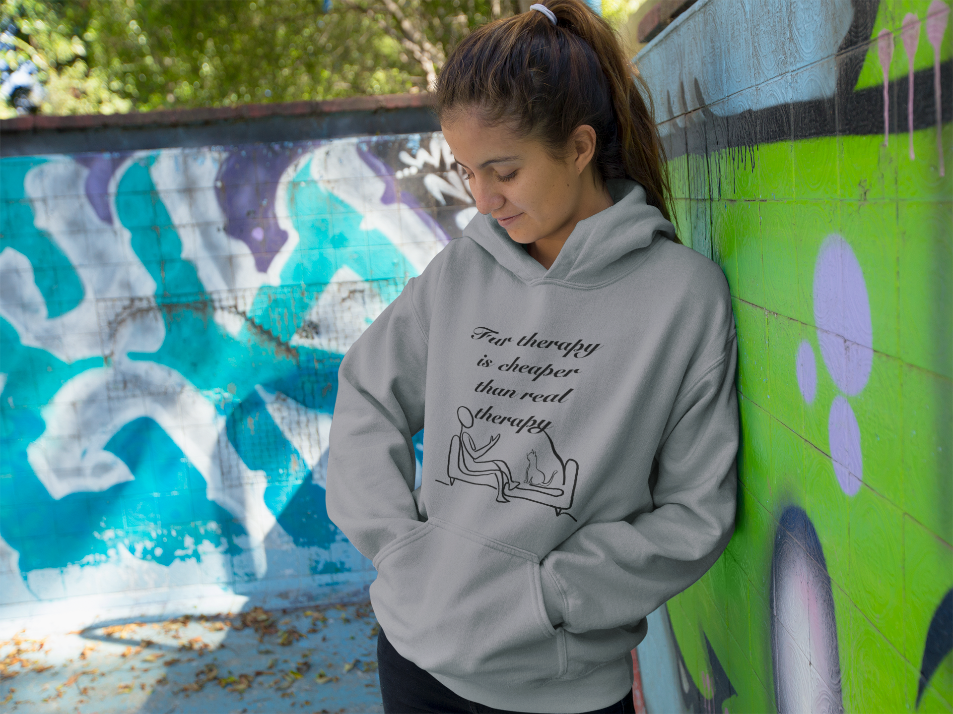Woman with ponytail wearing sport grey Fur Therapy Is Cheaper Than Real Therapy black ink cat hoodie – funny pet therapy design by GrungePup Sarcastic Affirmations
