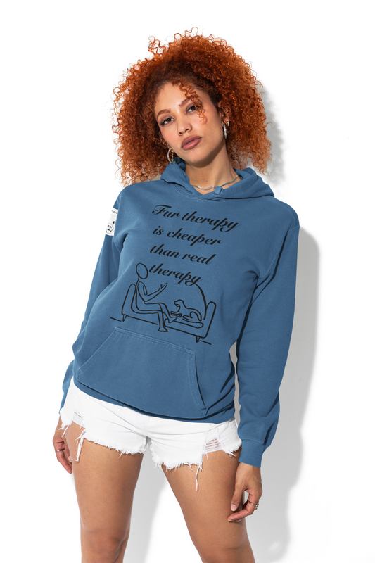 Woman with curly red hair wearing indigo blue Fur Therapy is Cheaper Than Real Therapy hoodie posing in white shorts