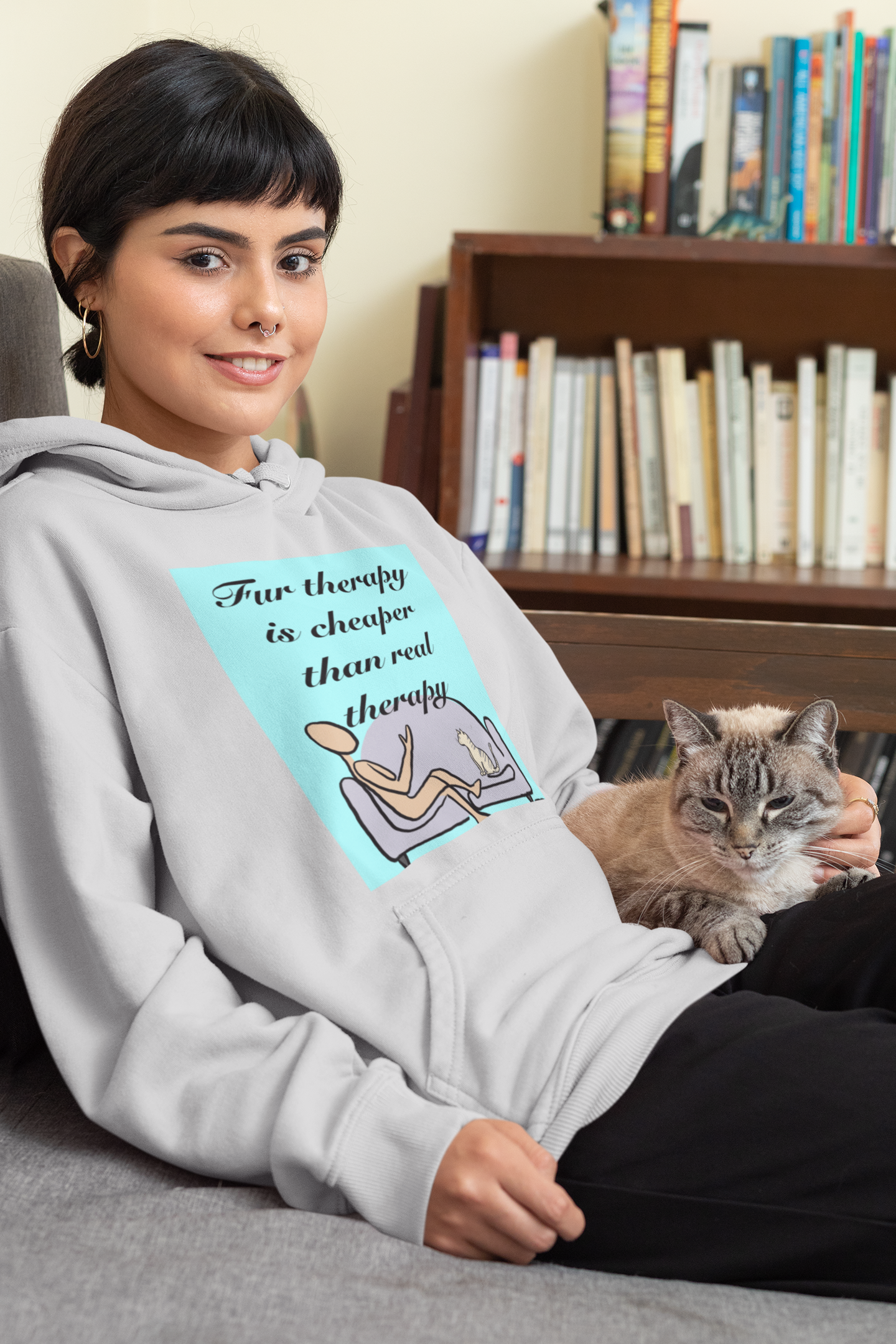 Woman sitting with cat on lap wearing ash Fur Therapy Is Cheaper Than Real Therapy colored cat hoodie – sarcastic lazy vibes affirmation by GrungePup Sarcastic Affirmations