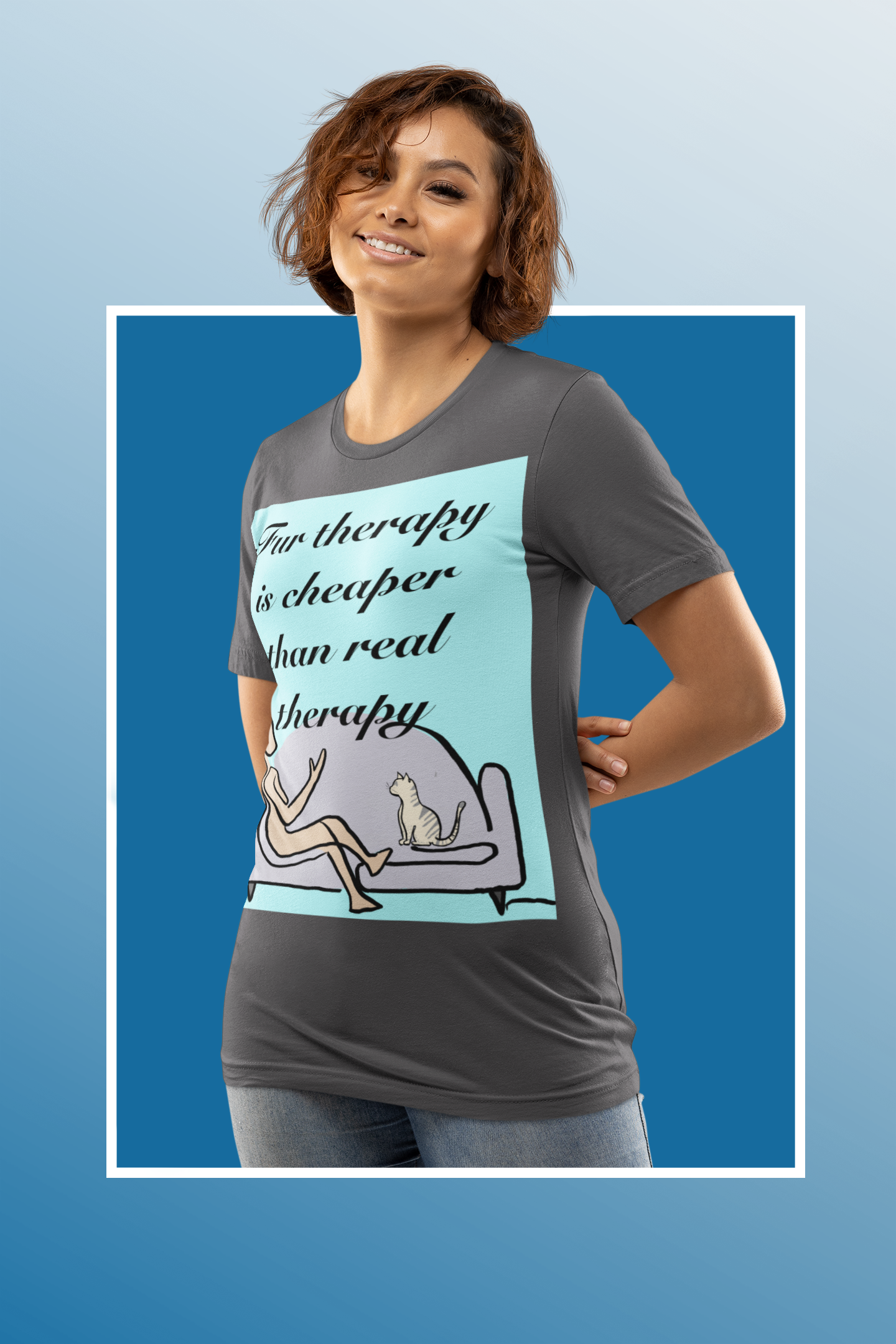 Woman with brown hair wearing dark grey heather Fur Therapy Is Cheaper Than Real Therapy colored cat t-shirt against blue background – funny pet therapy design by GrungePup Sarcastic Affirmations