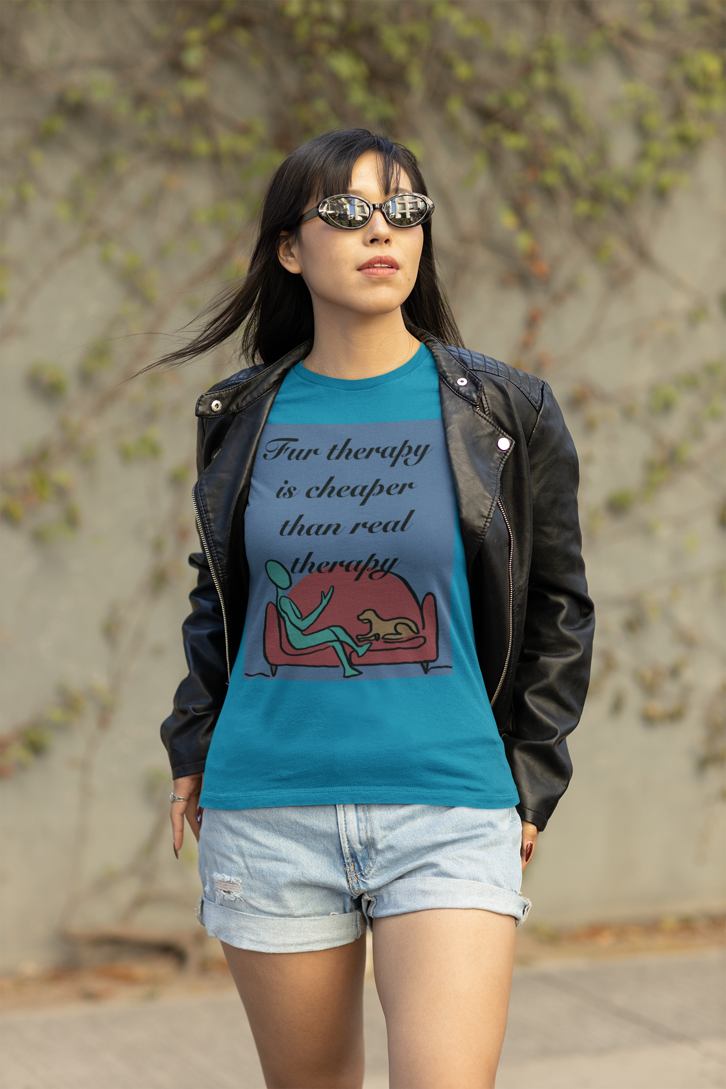 Woman with sunglasses and leather jacket wearing aqua Fur Therapy Is Cheaper Than Real Therapy colored dog t-shirt – relatable pet therapy humor by GrungePup Sarcastic Affirmations