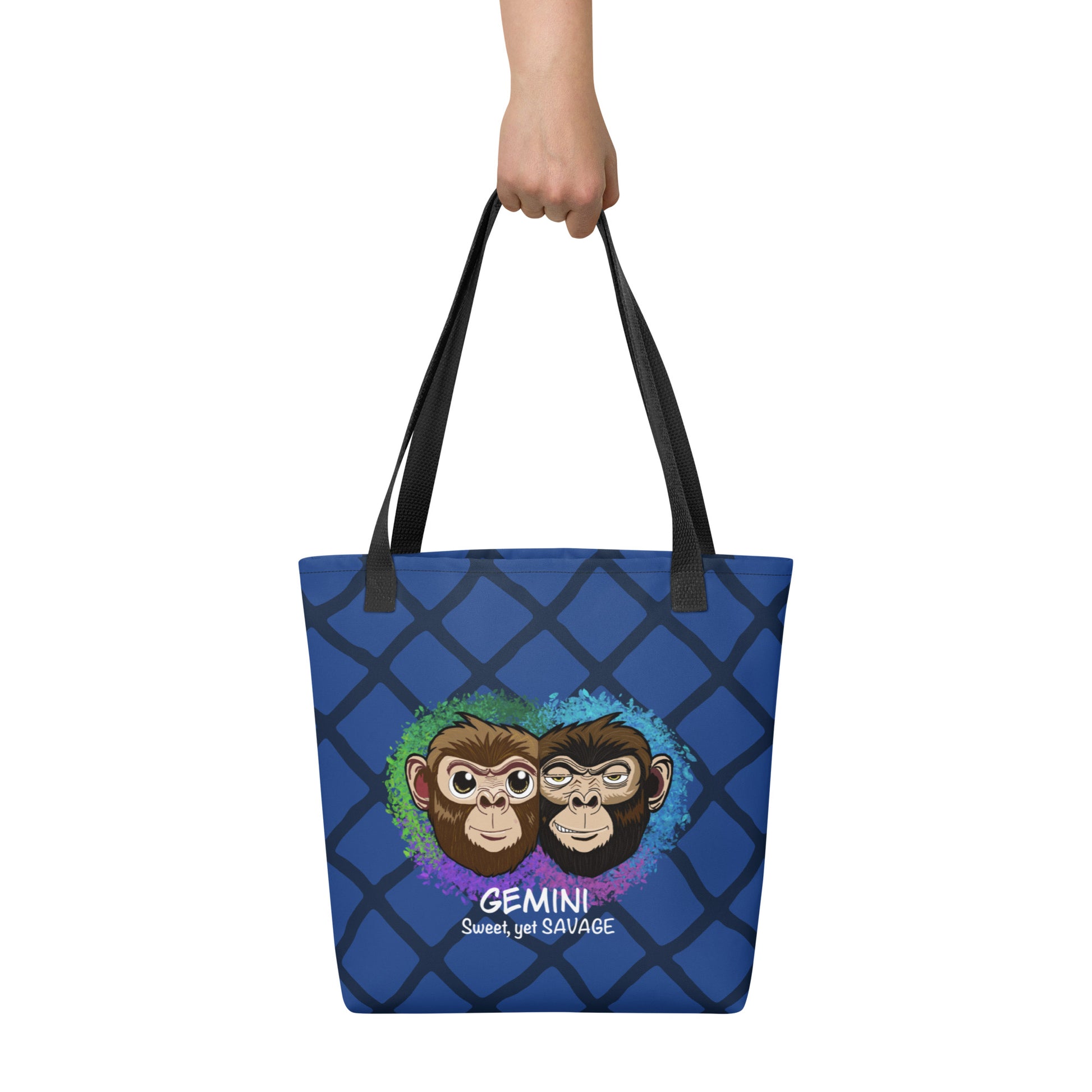 Front view of blue Gemini "Sweet, yet SAVAGE" tote bag with two monkey design on white background