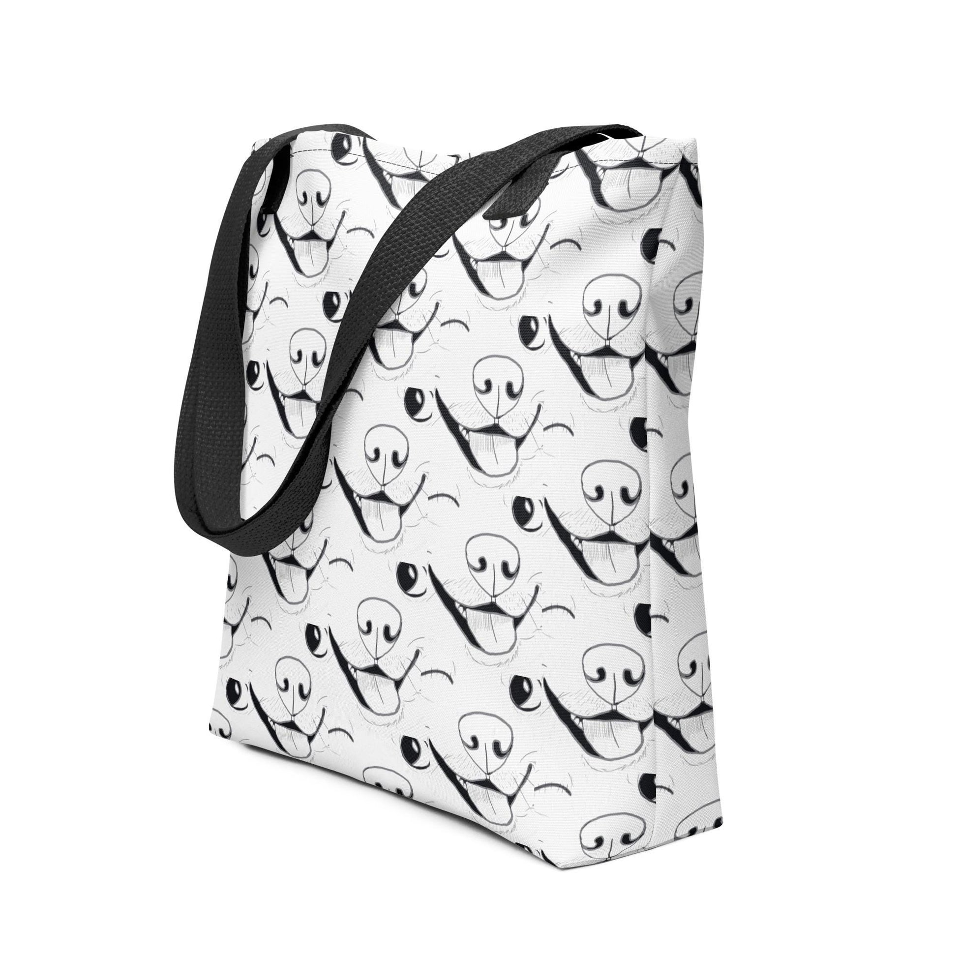 Side angle view of GrungePup logo all-over print tote bag showing depth and handle