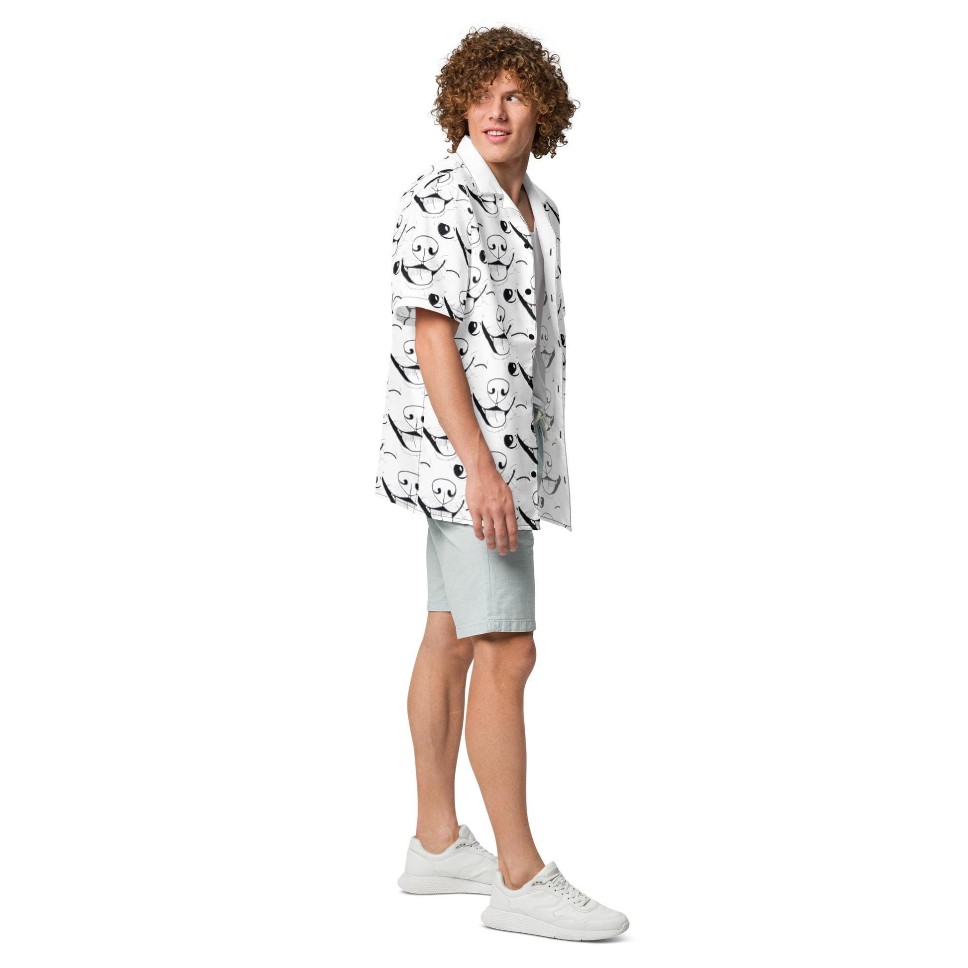 Man with curly hair standing outdoors wearing GrungePup logo all-over print button down shirt