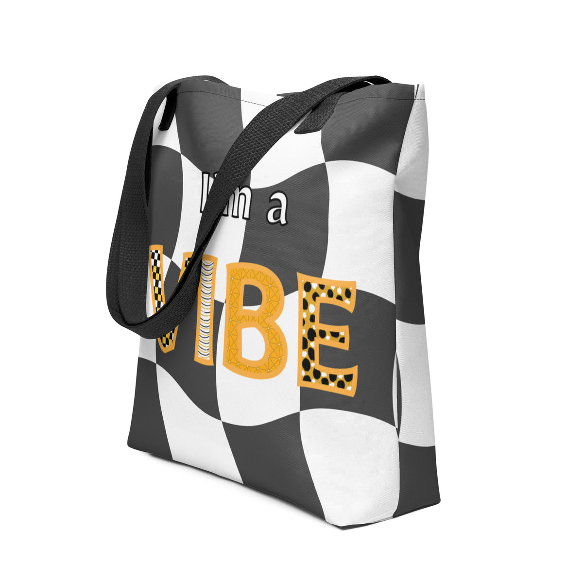 Side view of the grey checker I'm a Vibe tote with a black strap.