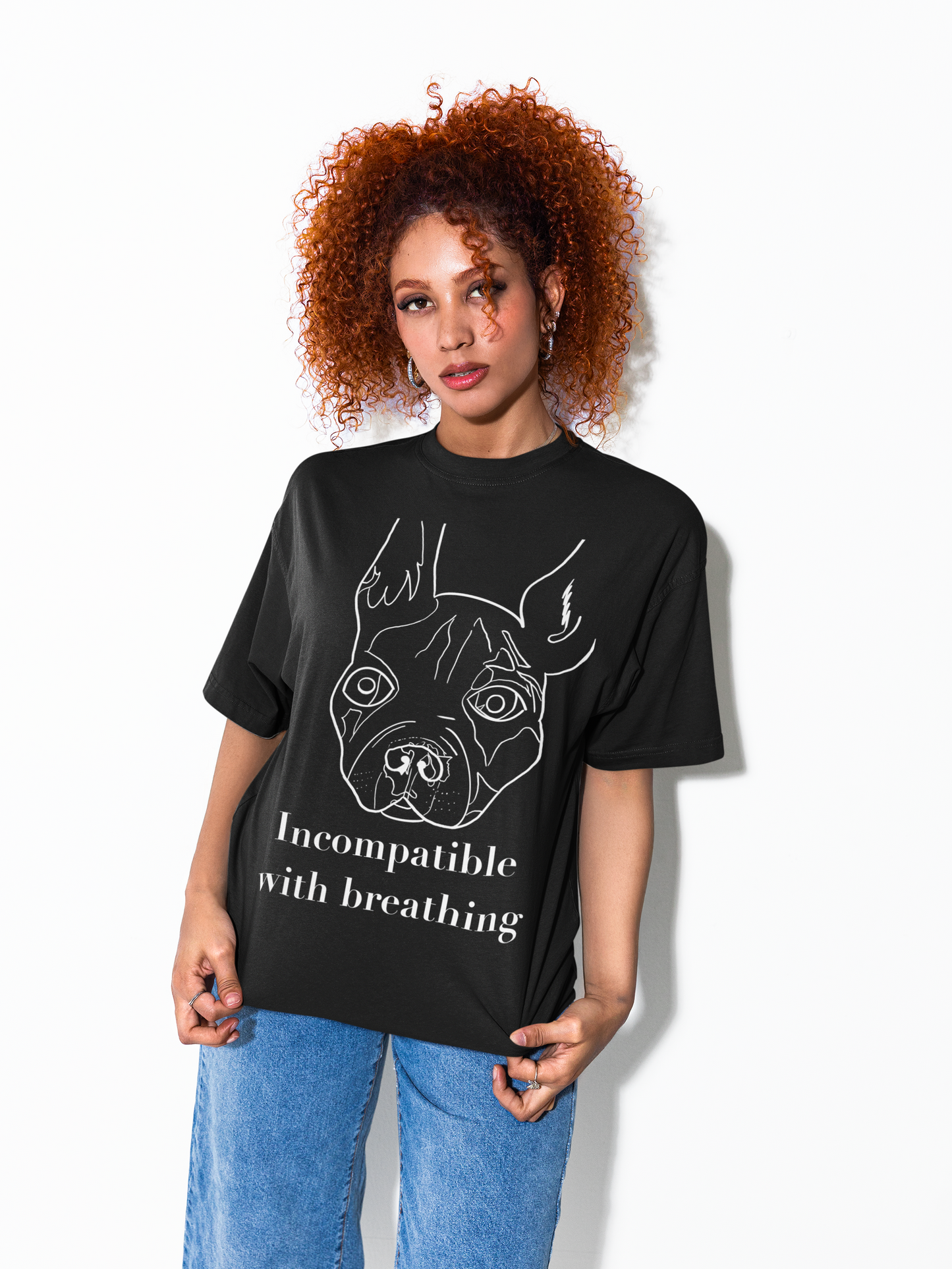 Woman standing against a white wall wearing black heather "Incompatible with Breathing" t-shirt with white ink French Bulldog line drawing – GrungePup Vet Chaos sarcastic apparel