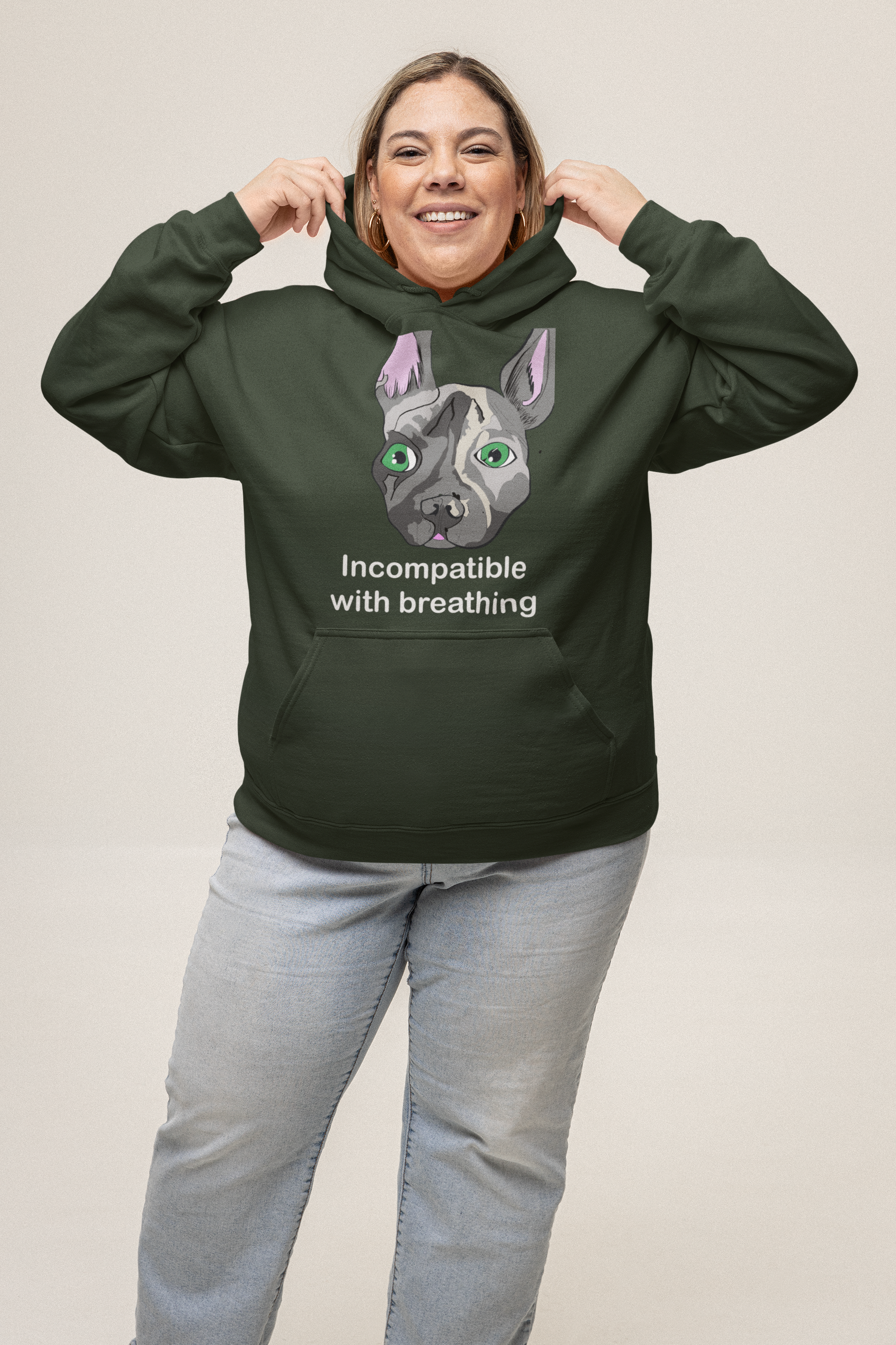 Plus-size woman wearing forest green "Incompatible with Breathing" hoodie with French Bulldog design – GrungePup Vet Chaos brachycephalic humor apparel