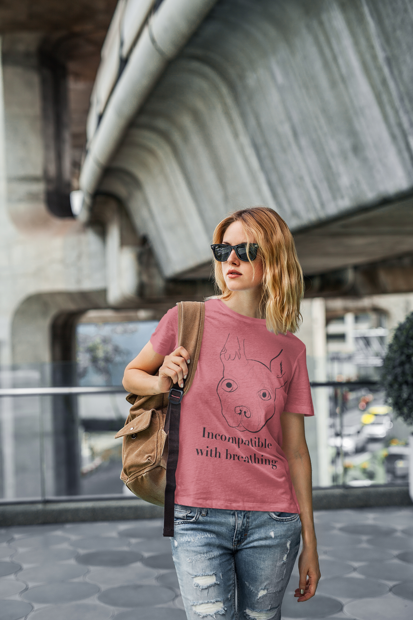 Man with tattoos wearing heather red "Incompatible with Breathing" t-shirt checking his phone – GrungePup Vet Chaos sarcastic vet med apparel