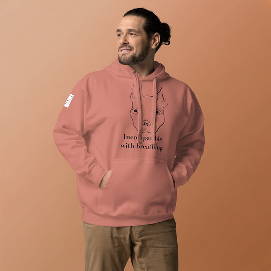Man with tied-back hair wearing dusty rose Incompatible with Breathing black ink hoodie featuring French Bulldog design
