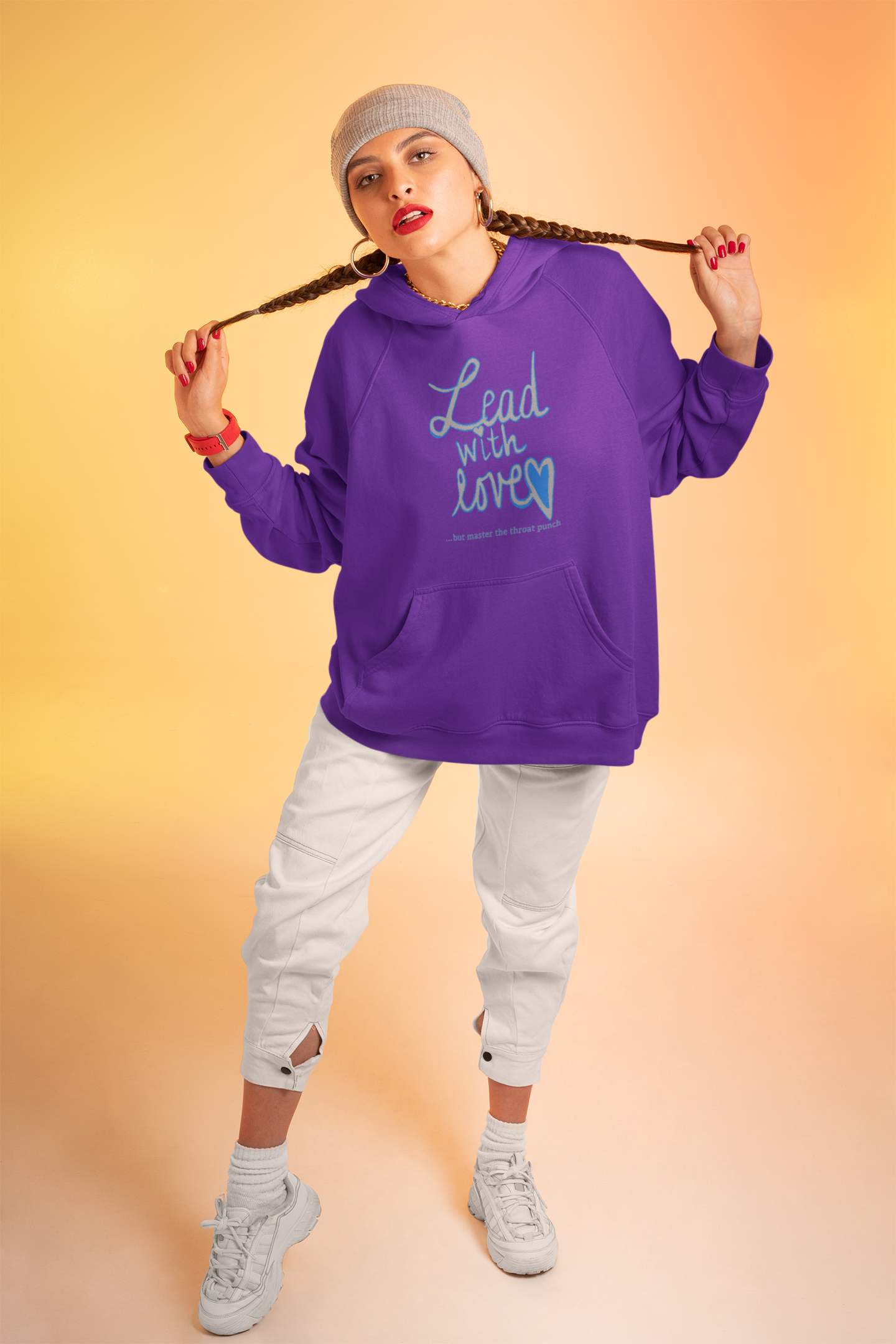 Woman sitting in purple Gildan 18500 hoodie featuring "Lead with Love… but master the throat punch" sarcastic self-care design. Soft heart with strong boundaries message for empaths who protect their peace.