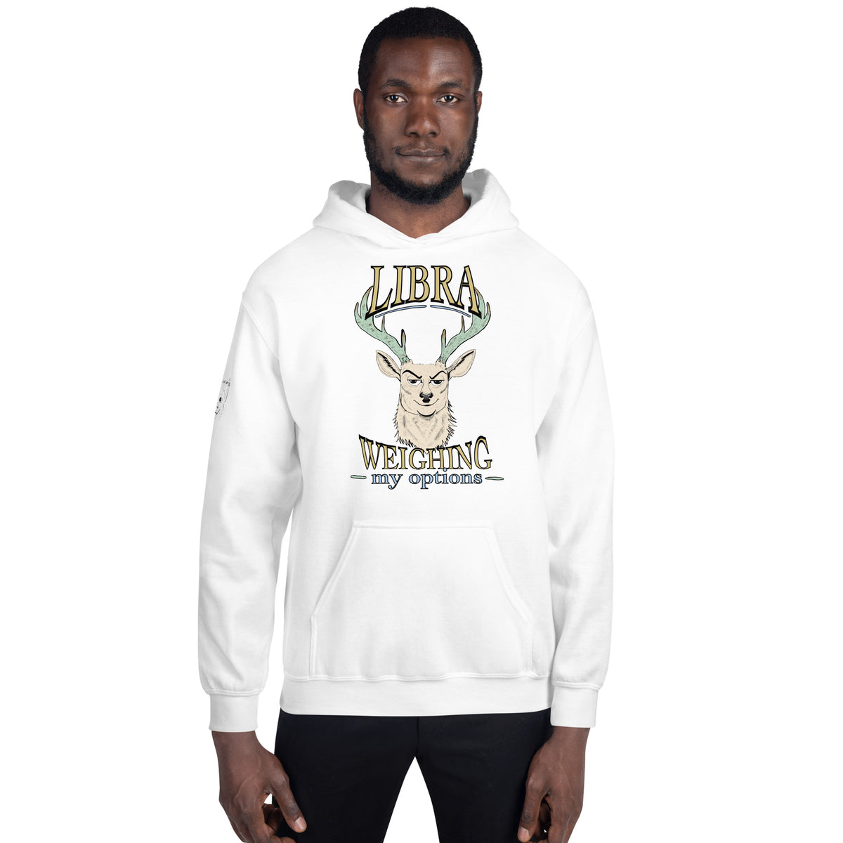 Man standing in a white Libra Weighing My Options hoodie, cream stag with mint antlers and gold lettering on the chest.