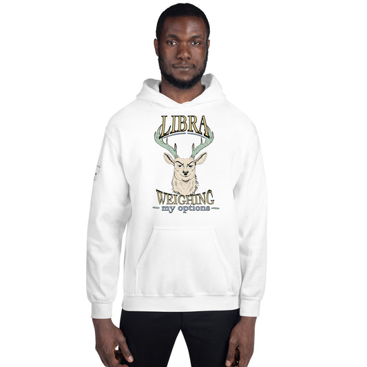 Man standing in a white Libra Weighing My Options hoodie, cream stag with mint antlers and gold lettering on the chest.
