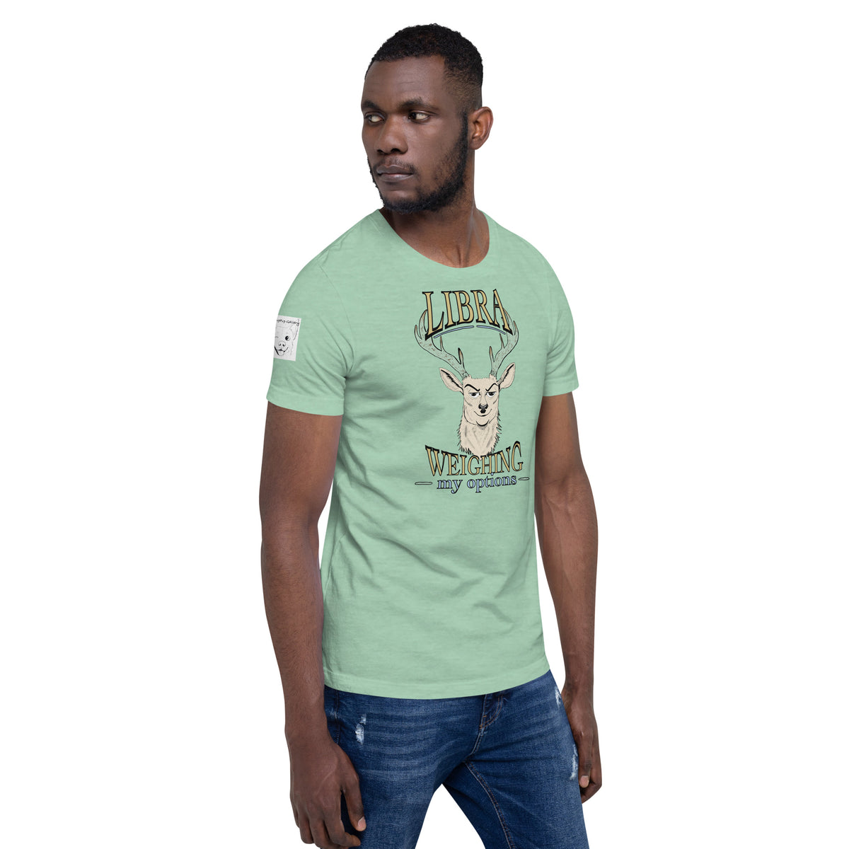 Man wearing a heather prism mint Libra Weighing My Options tee, cream stag with mint antlers and gold lettering.