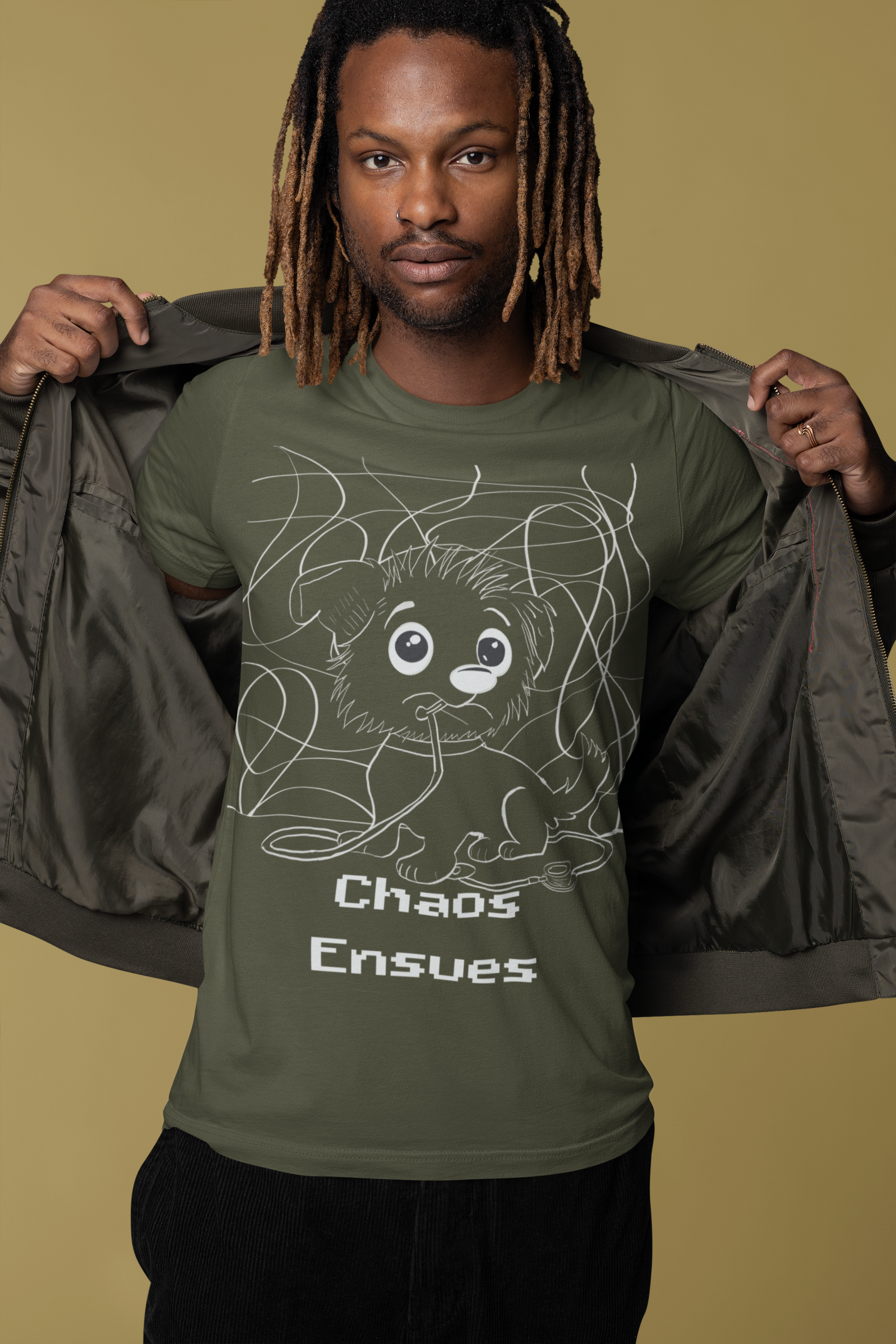 Man opening jacket to show military green Chaos Ensues t-shirt with white ink