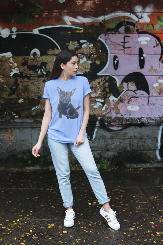 Woman standing in front of graffiti wall wearing carolina blue Mathis Pet Portrait t-shirt