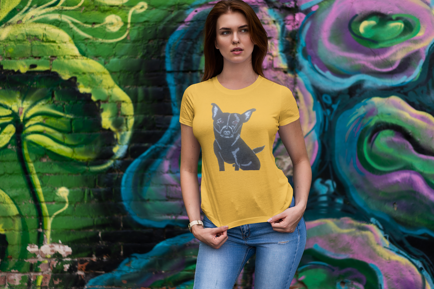 Woman standing in front of colorful graffiti wearing gold yellow Mathis Pet Portrait t-shirt