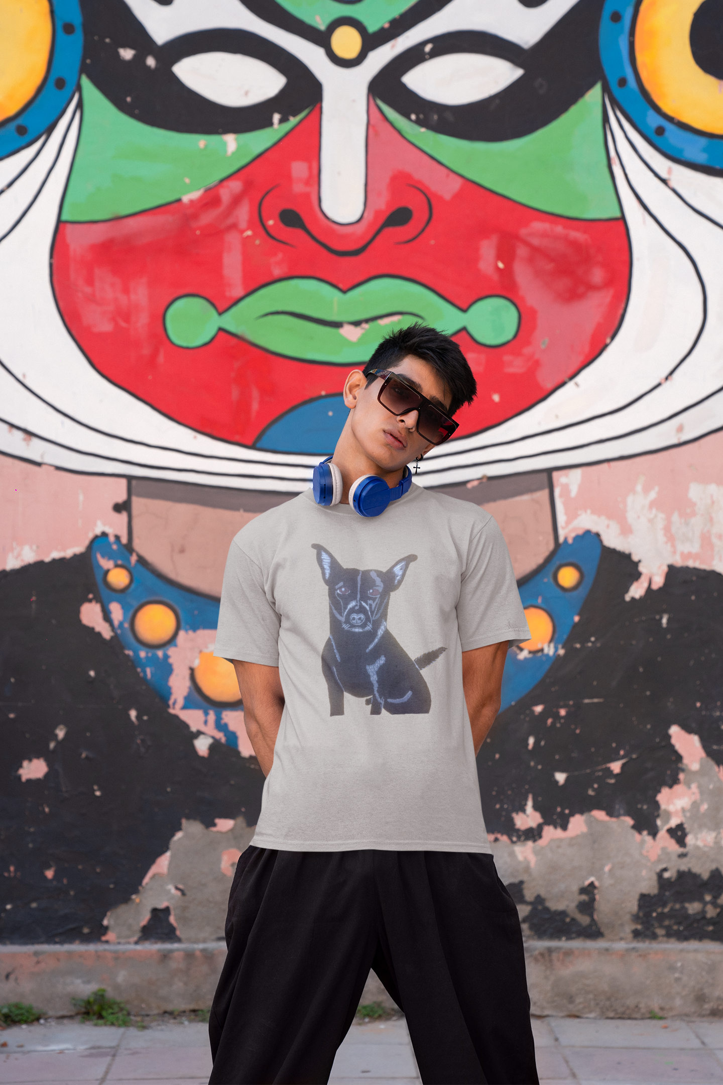 Man standing in front of graffiti wall wearing sport grey Mathis Pet Portrait t-shirt