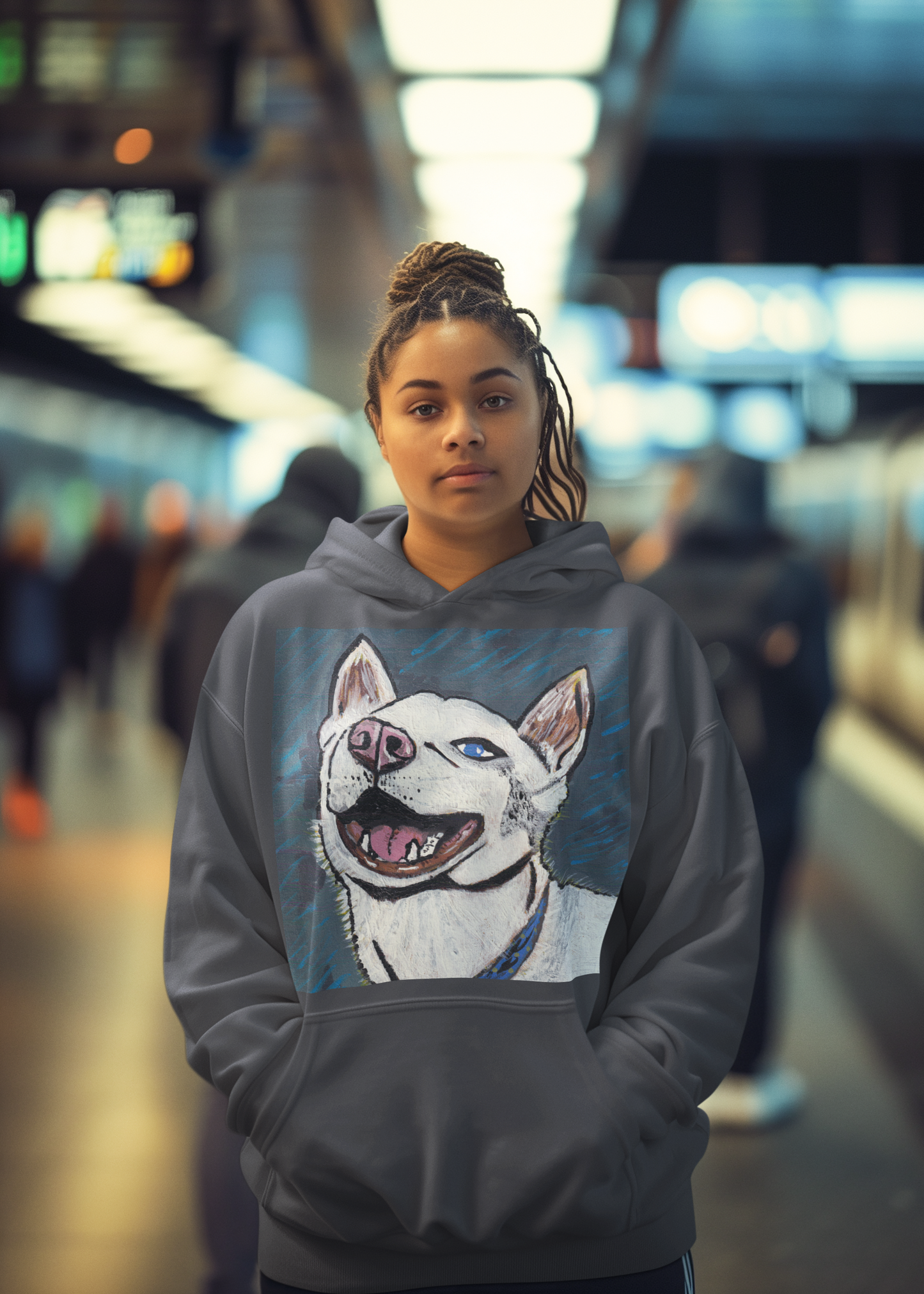 Woman with hair in a bun wearing dark heather gray Nico Face hoodie