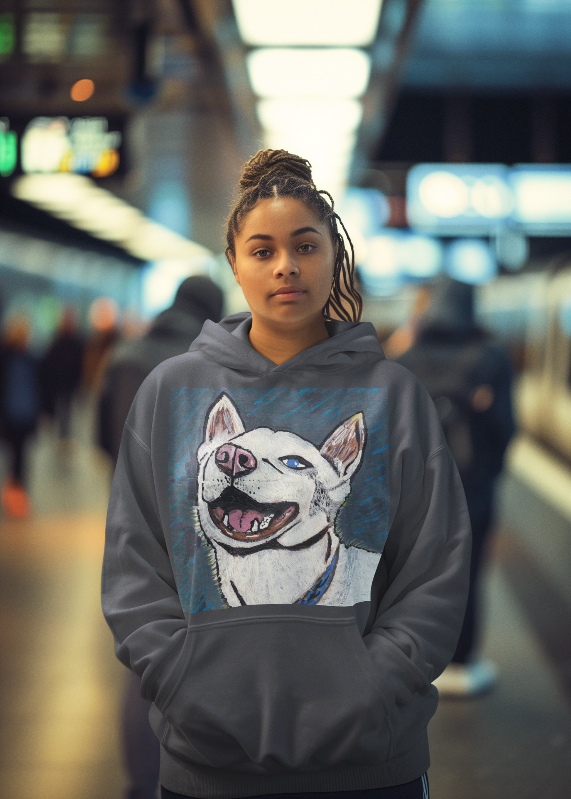 Woman with hair in a bun wearing dark heather gray Nico Face hoodie