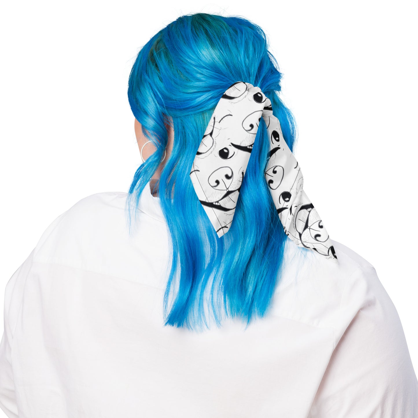 Person with bright blue hair wearing Nico Inspired all-over print bandana as a head wrap