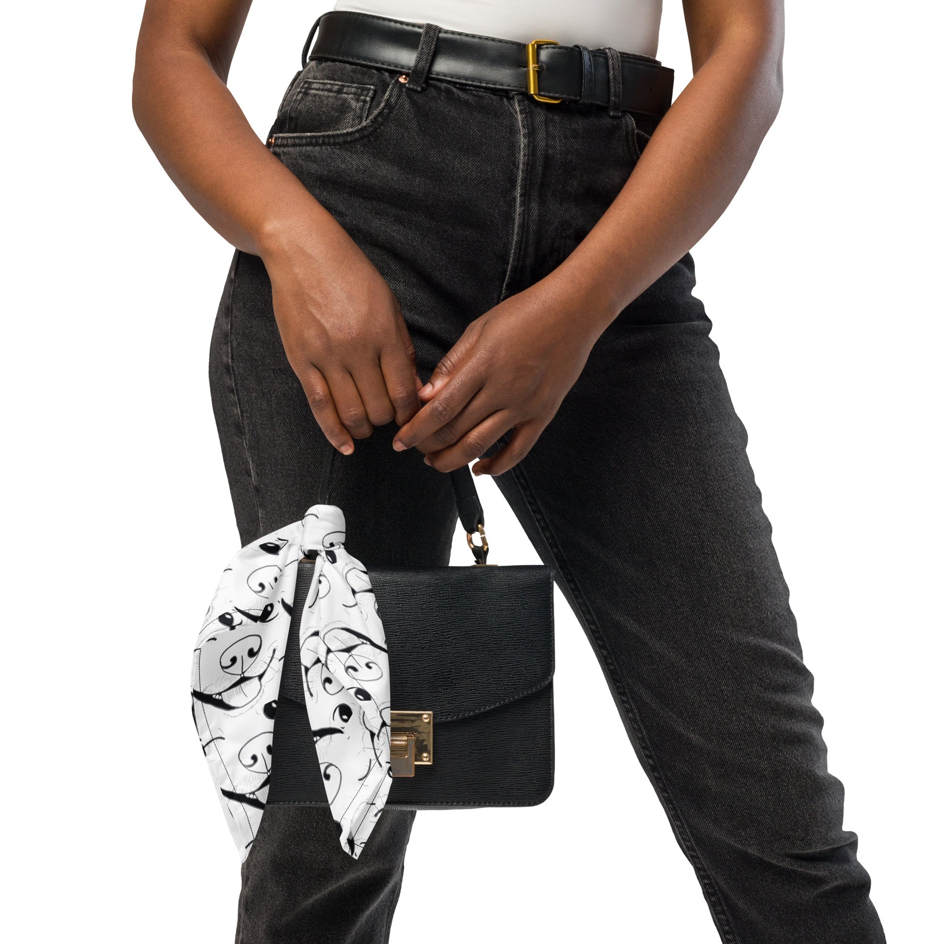 Nico Inspired all-over print bandana tied on a black purse