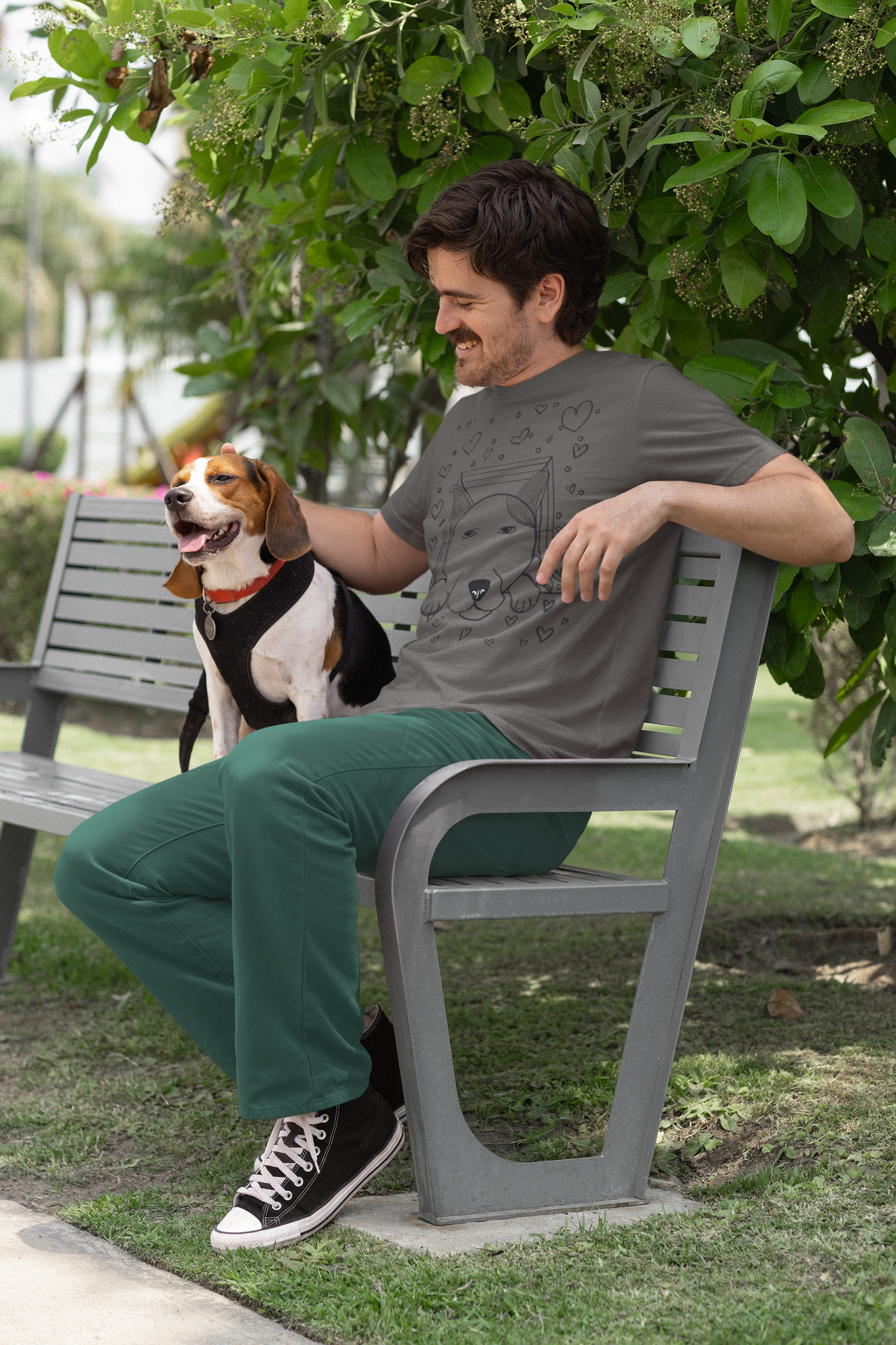 Man sitting on bench with beagle wearing asphalt "Pup Love" t-shirt with dog illustration and hearts – GrungePup Vet Chaos dog lover apparel