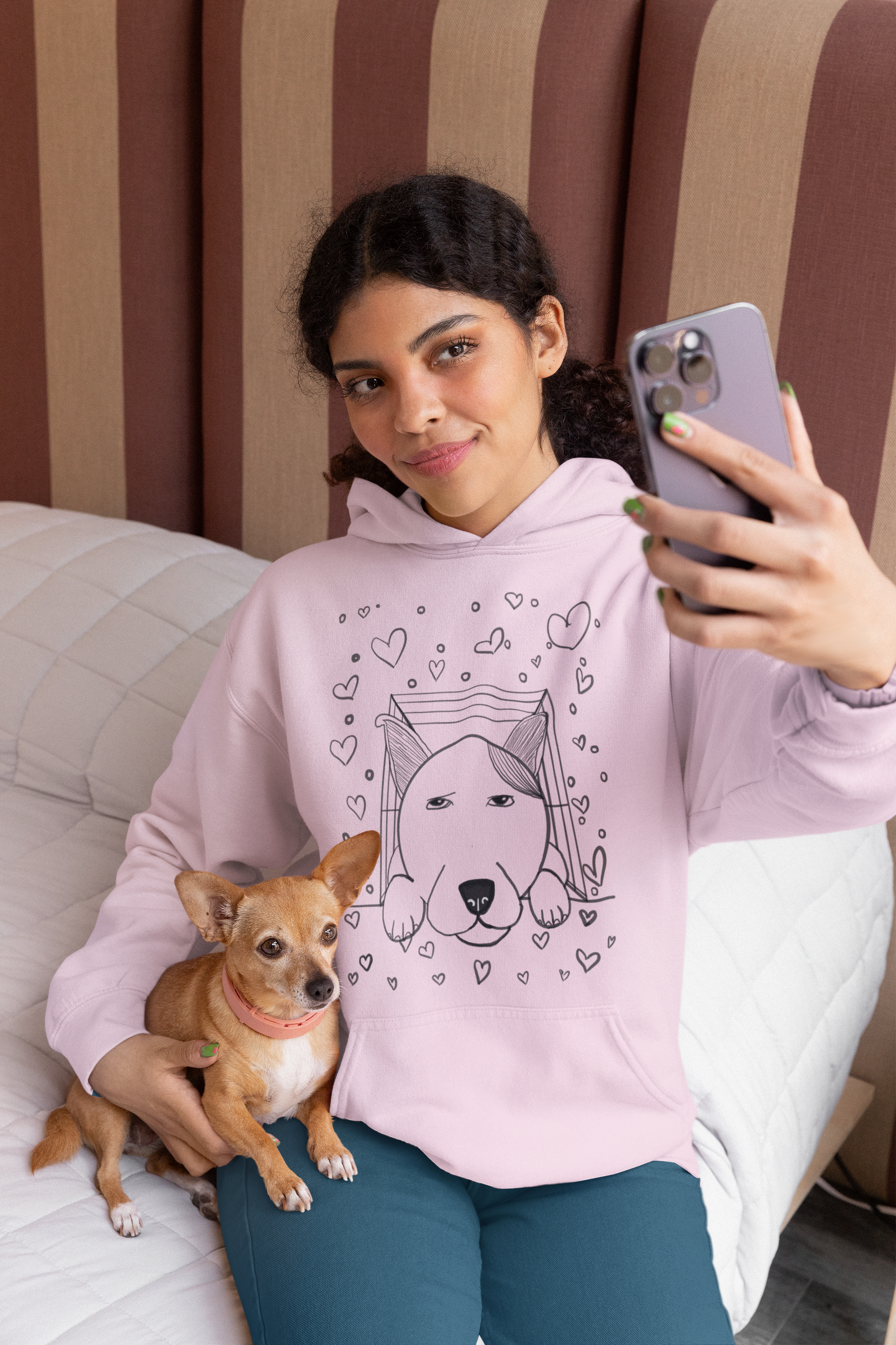 Woman taking selfie with puppy wearing light pink "Pup Love" hoodie with dog illustration and hearts – GrungePup Vet Chaos cute pet lover design