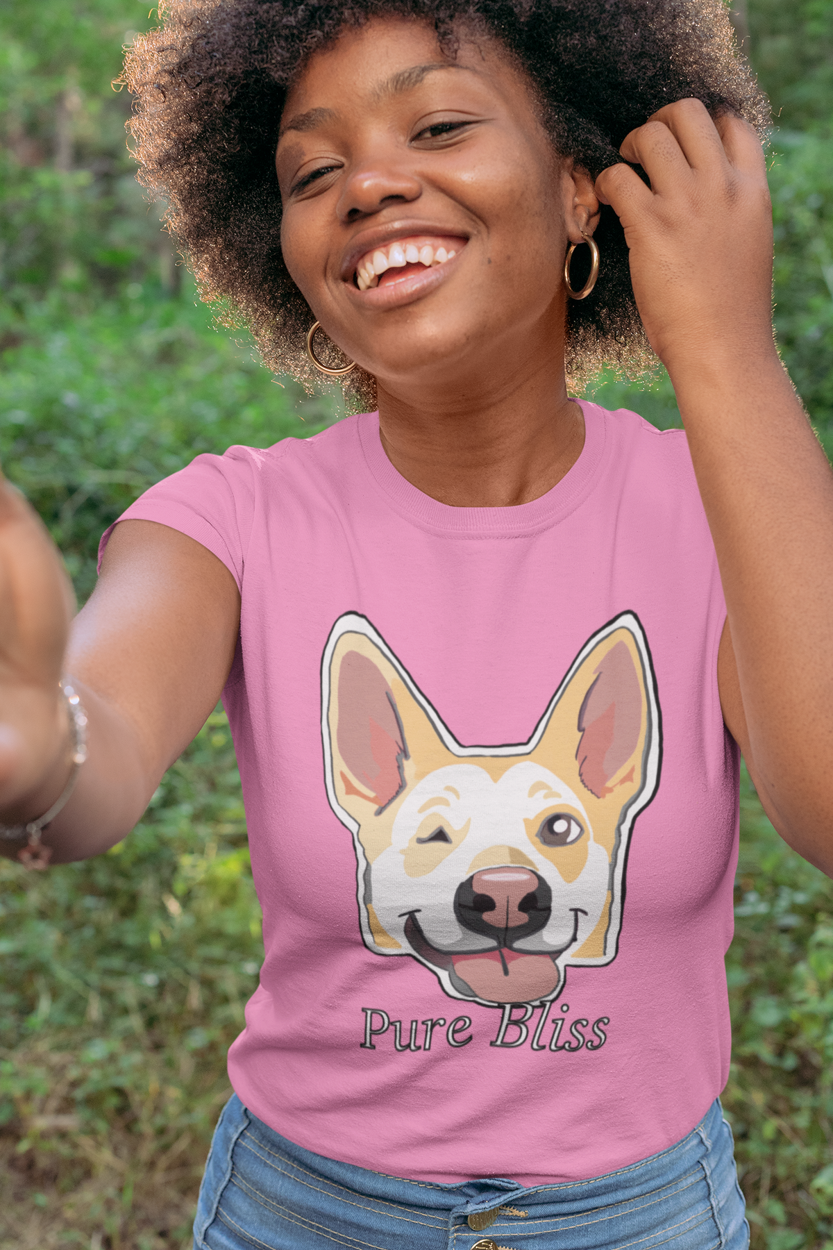 Smiling woman in an azalea Pure Bliss t-shirt outdoors. Nico Inspired by GrungePup Gallery.