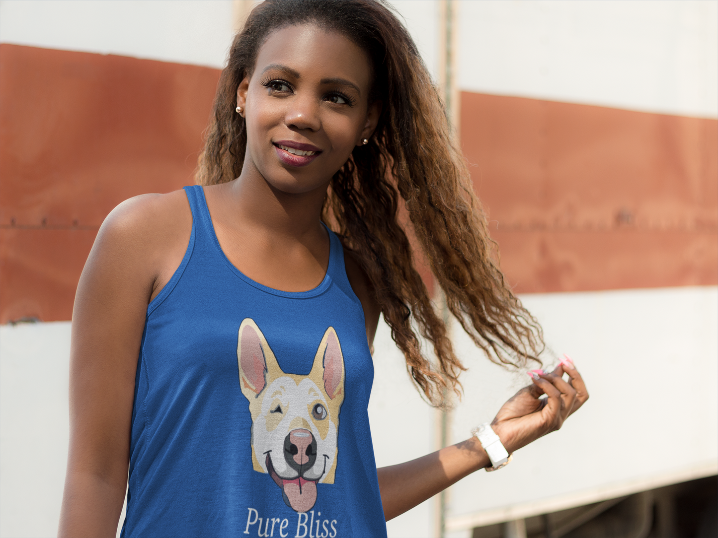 Woman pulling her hair back wearing vintage royal blue Pure Bliss Nico Face racerback tank top