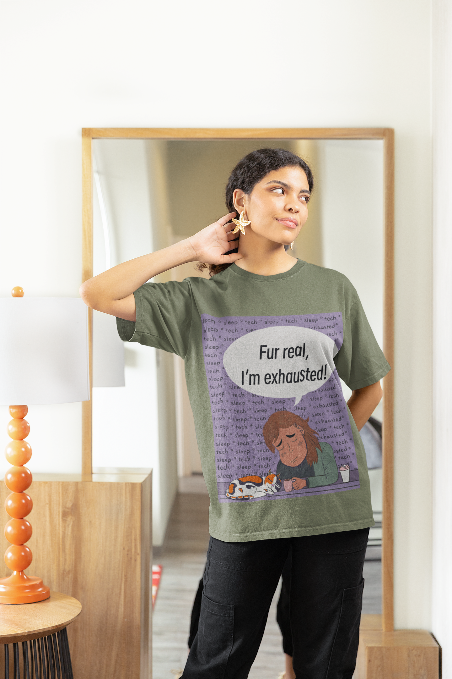 Smiling woman wearing a military green Fur Real, I'm Exhausted t-shirt