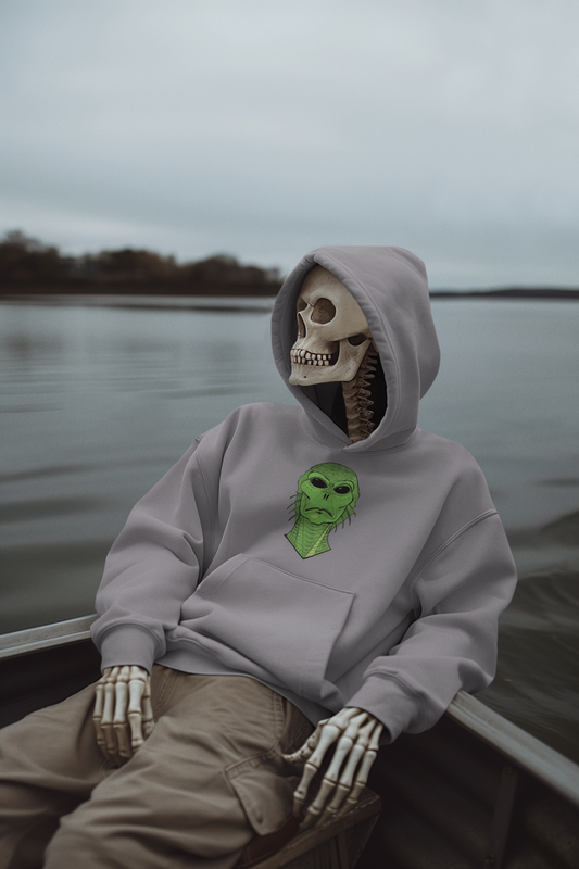 Skeleton sitting in a boat wearing a sport grey hoodie, Swamp Thang creature face on the chest