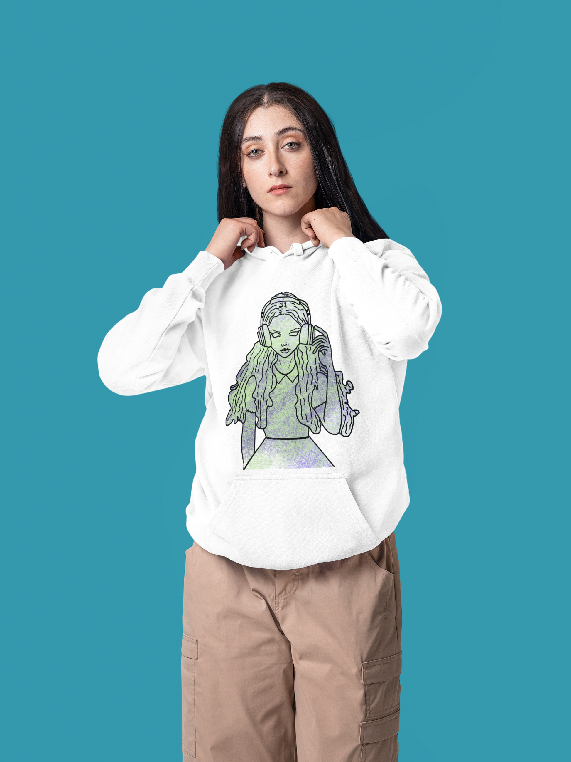Lady standing with blue background wearing white Gildan hoodie featuring That Girl, Alice grunge-cute Wonderland design. Playful yet edgy style for the dreamers who came out of the rabbit hole with attitude.