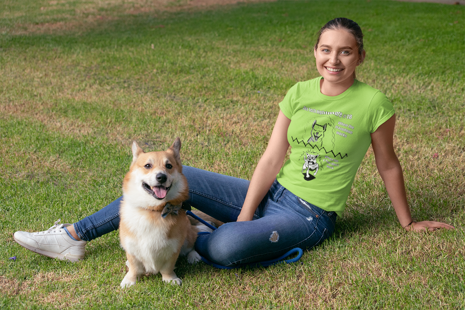 Woman laying on grass wearing a lime green Gildan 5000 t-shirt featuring the Vet Tech Nightmare #18 split design with the peaceful dog ("When the Trazodone Works") and the chaotic demonic dog ("When the Trazo-Don't Work").