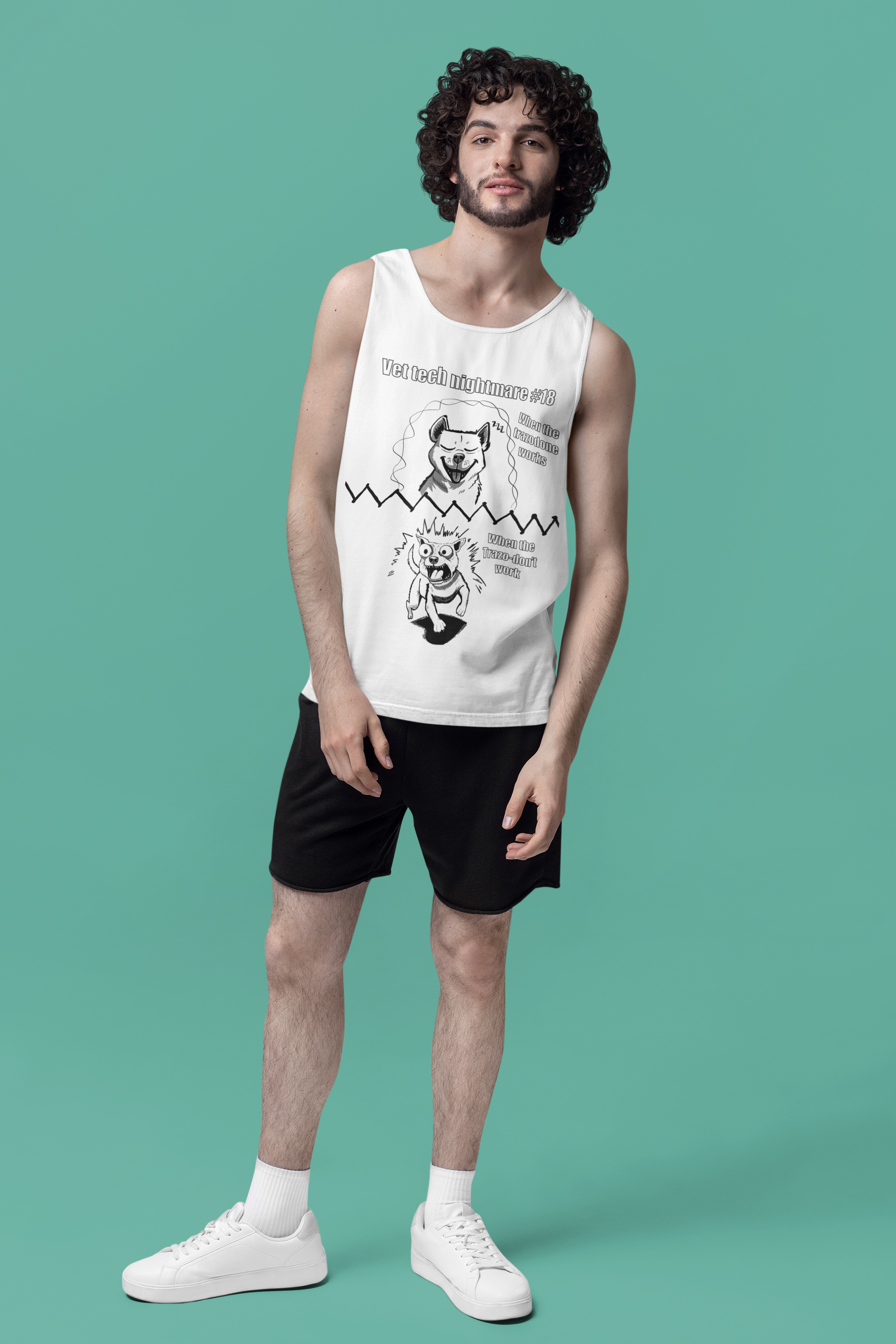 Man standing in studio wearing a white Comfort Colors 9360 tank top with Vet Tech Nightmare #18 design showing the "When the Trazodone Works" and "When the Trazo-Don't Work" panels.