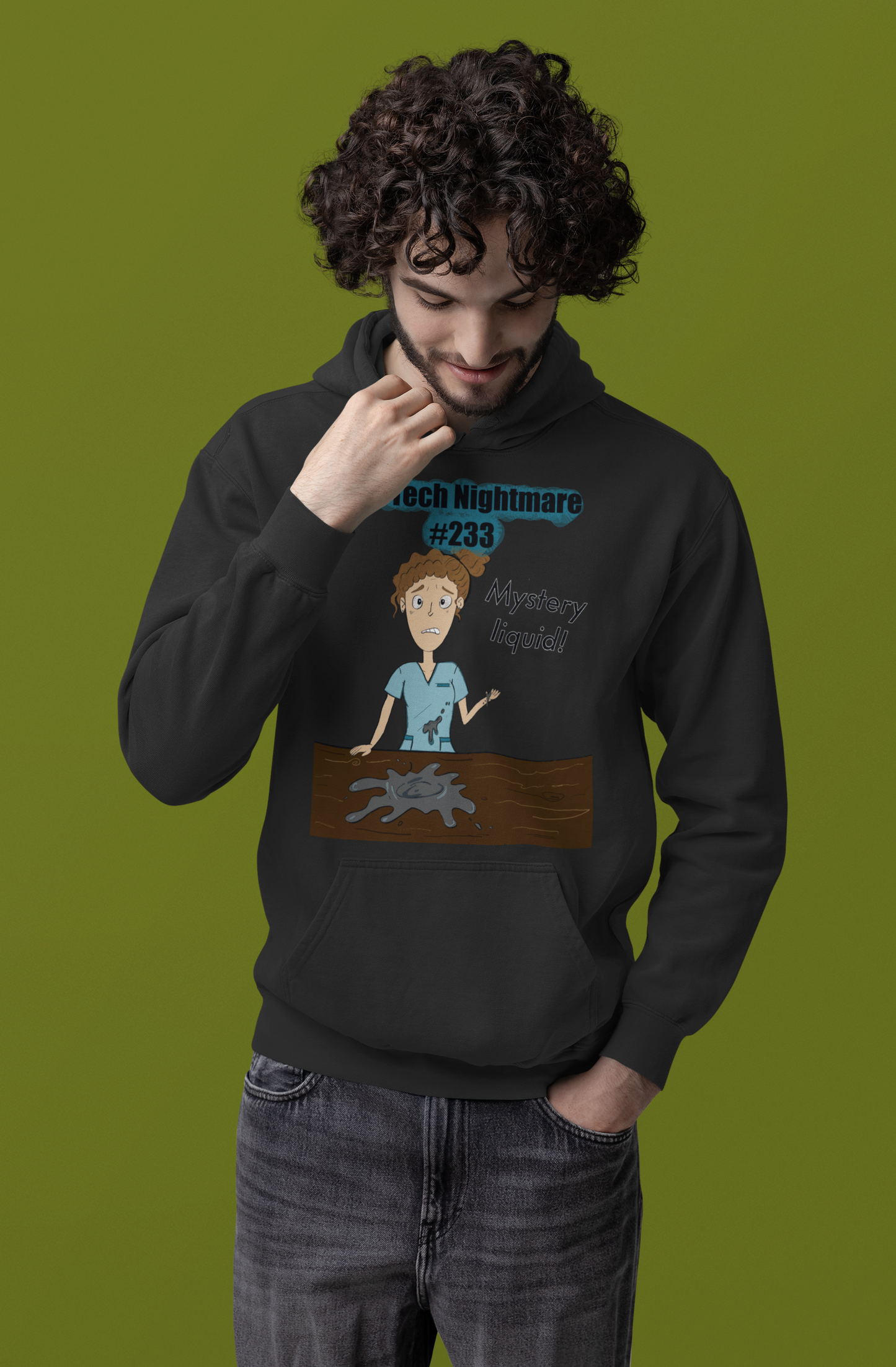Bearded man with curly hair smiling in studio wearing black Comfort Colors hoodie featuring Vet Tech Nightmare #233 Mystery Liquid design