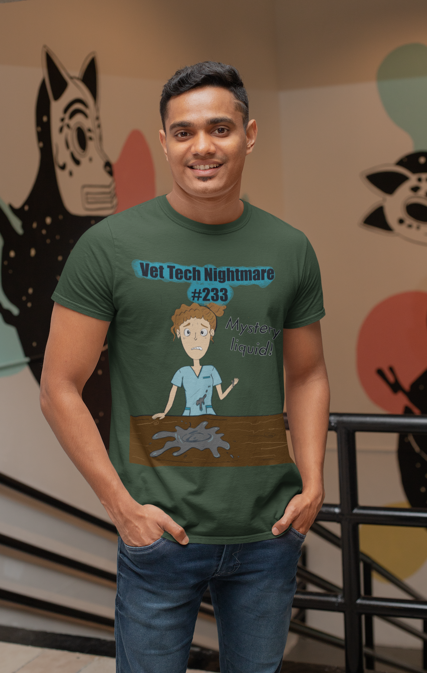 Man standing by wall with paintings wearing forest green t-shirt with Vet Tech Nightmare #233 Mystery Liquid graphic