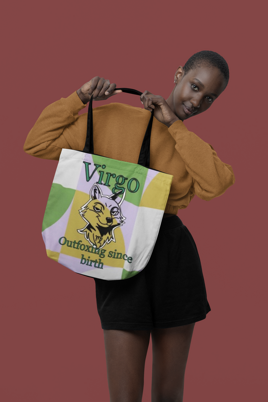 Woman holding the Virgo Outfoxing Since Birth all-over print tote bag with gold, green, and lavender geometric background.