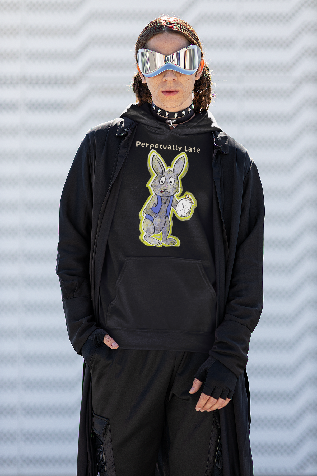 Person in silver shield sunglasses and a studded choker wearing a black White Rabbit Perpetually Late hoodie under a long black coat. GrungePup That Girl, Alice.