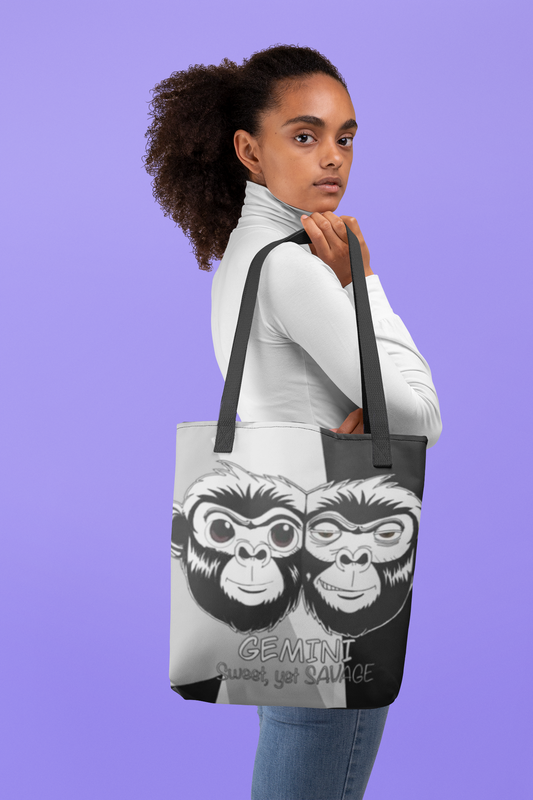 Woman with curly hair holding the Gemini Sweet Yet Savage black and white all-over print tote bag against a purple background