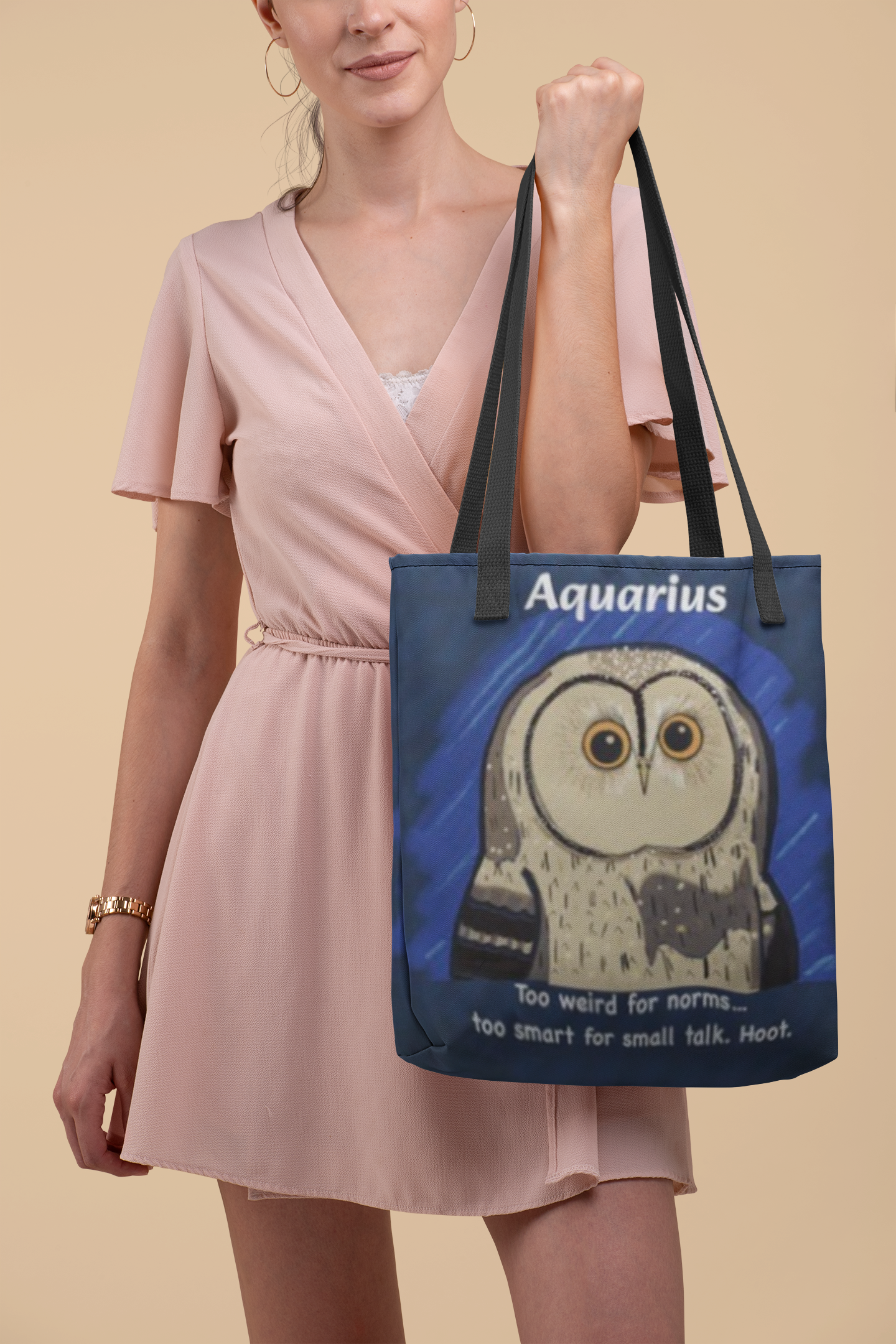 Woman wearing a pink dress walking while carrying the Aquarius Owl all-over print tote bag featuring a wise grunge owl on dark blue background from GrungePup Sarcastic Zodiac