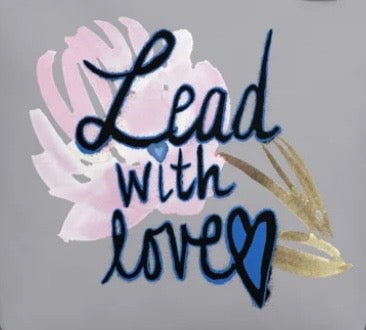 Close-up of the tote’s back print, a different floral design from the front Lead with Love artwork, on grey fabric.